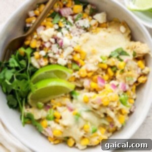 Mexican corn and chicken casserole in a white bowl.