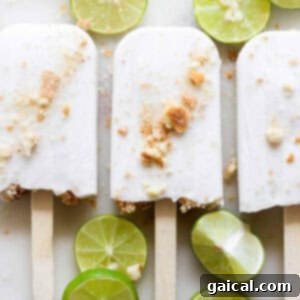 Zesty Coconut Key Lime Frozen Treats 12 Finished Coconut Key Lime Pie Popsicles, frozen and ready to be removed from molds.