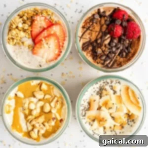 Top-down view of four jars filled with different flavors of overnight oats, garnished with toppings like strawberries, chocolate, raspberries, nuts, and coconut flakes, arranged in a 2x2 grid.