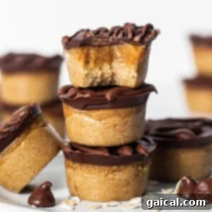 Protein-Packed Peanut Butter Twix Bars 4 Peanut butter cups stacked on a plate.