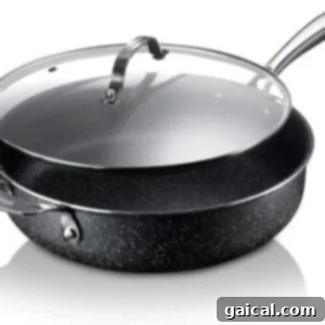 Beefy Cottage Queso 4 A versatile black pot with a lid, suitable for one-pot meals and stovetop recipes.