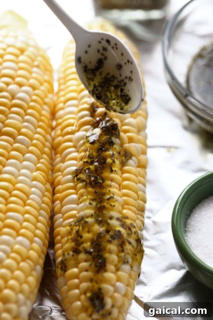 Charred Mediterranean Street Corn with Feta 3 Close-up shot of Mediterranean Grilled Street Corn with Feta Cheese and fresh herbs, showcasing the vibrant colors and appealing texture.