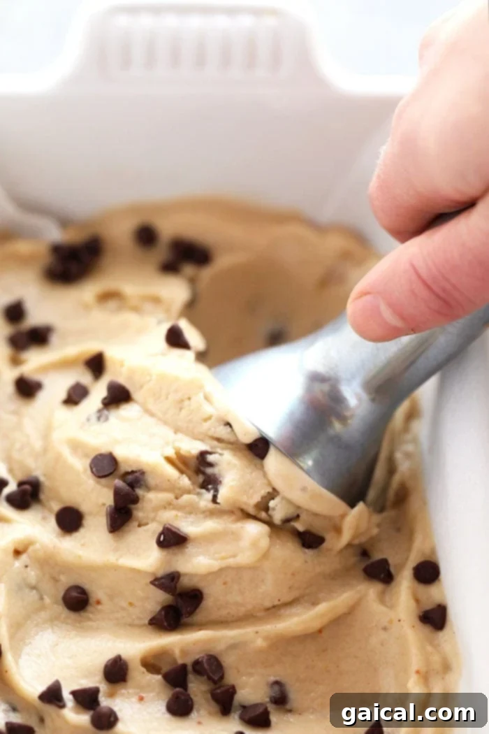 Nutty Chocolate Banana Dream Freeze 6 A large scoop of Peanut Butter Banana Nice Cream being served into a bowl