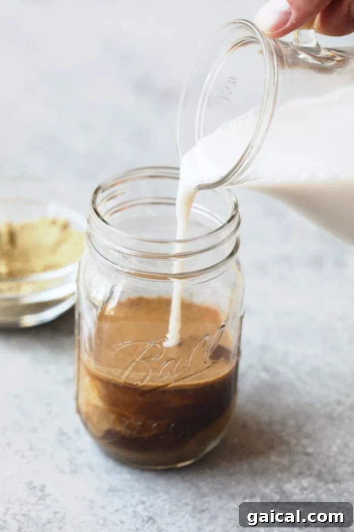 Protein-Infused Cold Brew 4 All you need are three ingredients to make the most delicious post-workout, protein-packed drink there is: cold brew + unsweetened almond milk + protein powder.
