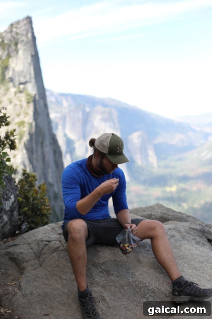 Fit Foodie Yosemite 48 Hour Itinerary 14 Majestic waterfall cascading down granite cliffs in Yosemite