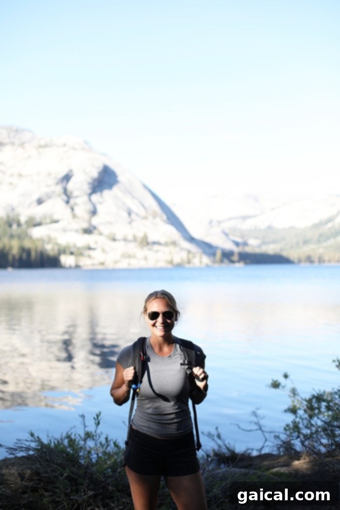 Fit Foodie Yosemite 48 Hour Itinerary 5 Hikers enjoying the serene glacial waters of Tenaya Lake in Yosemite