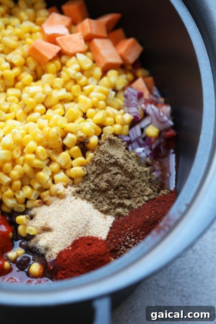Whip up this savory Slow Cooker Mexican Quinoa for a pantry-staple meal that's also naturally vegan and gluten-free! Mexican quinoa ingredients, uncooked, in slow cooker