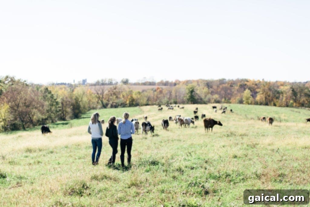 Becky Gretebeck, an Organic Valley farmer, sharing her extensive knowledge about sustainable dairy practices with an eager group of visitors.