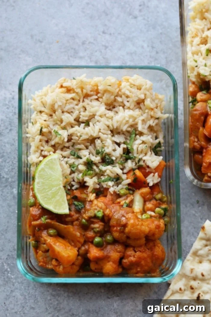 Meal Prep Cauliflower Tikka Masala Cauliflower Tikka Masala portioned in a meal prep container, ready for the week.