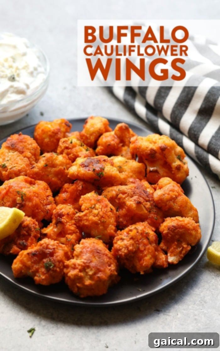 Crispy Buffalo Cauliflower Bites 2 Plate of crispy buffalo cauliflower wings with blue cheese dip