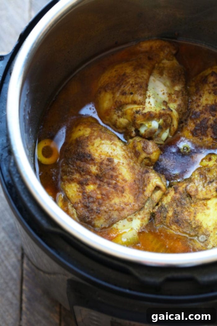 Moroccan Chicken Thighs cooking in the Instant Pot