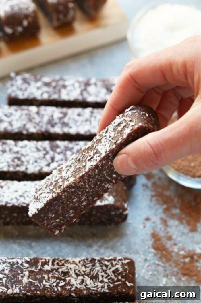 Effortless Chocolate Coconut Energy Bars 2 These No-Bake Chocolate Coconut Energy Bars are the perfect sweet treat when your sweet tooth is calling to you! They are naturally sweetened and the perfect snack to get you to your next meal!