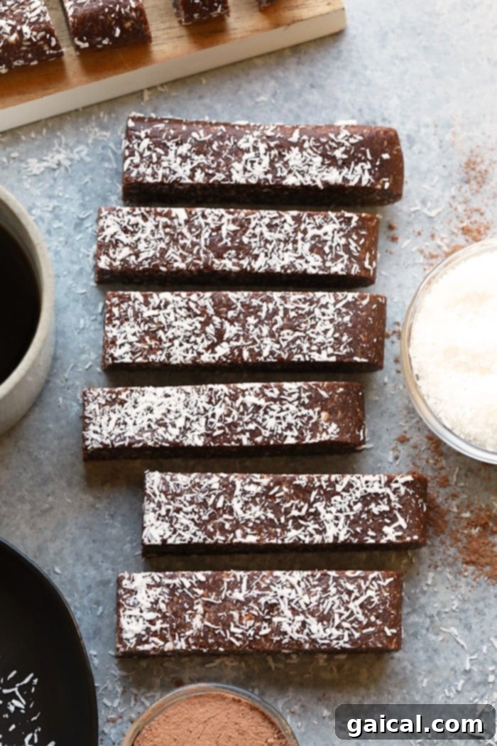 Effortless Chocolate Coconut Energy Bars 5 These No-Bake Chocolate Coconut Energy Bars are the perfect sweet treat when your sweet tooth is calling to you! They are naturally sweetened and the perfect snack to get you to your next meal!