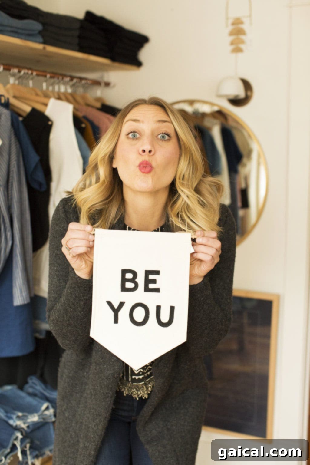 A woman smiling confidently, representing resilience and open discussion about anxiety and depression. The image captures a moment of peace and self-acceptance, suitable for a blog post about mental health recovery.