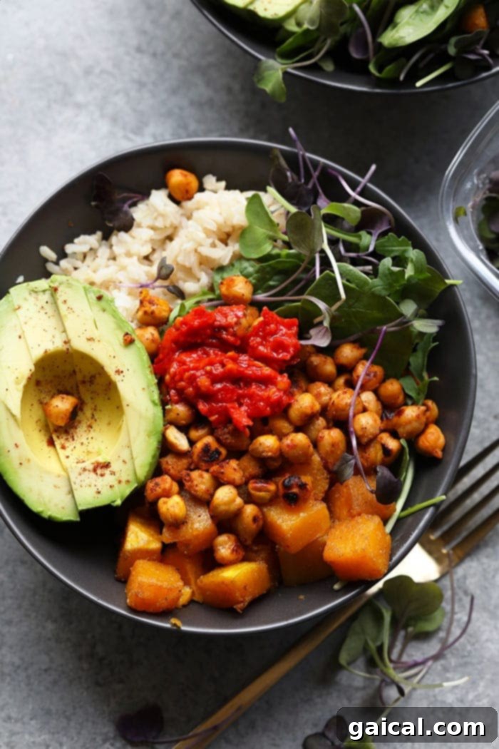 Vibrant Butternut Squash Buddha Bowl with brown rice, crunchy chickpeas, roasted squash, and fresh greens