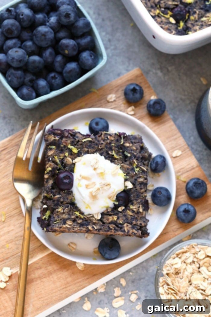 This delicious lemon blueberry baked oatmeal recipe screams spring with the combination of fresh blueberries and lemon zest. This delicious vegan baked oatmeal is made in under an hour and has 100% whole grains and no refined sugar. Delicious Lemon Blueberry Vegan Baked Oatmeal