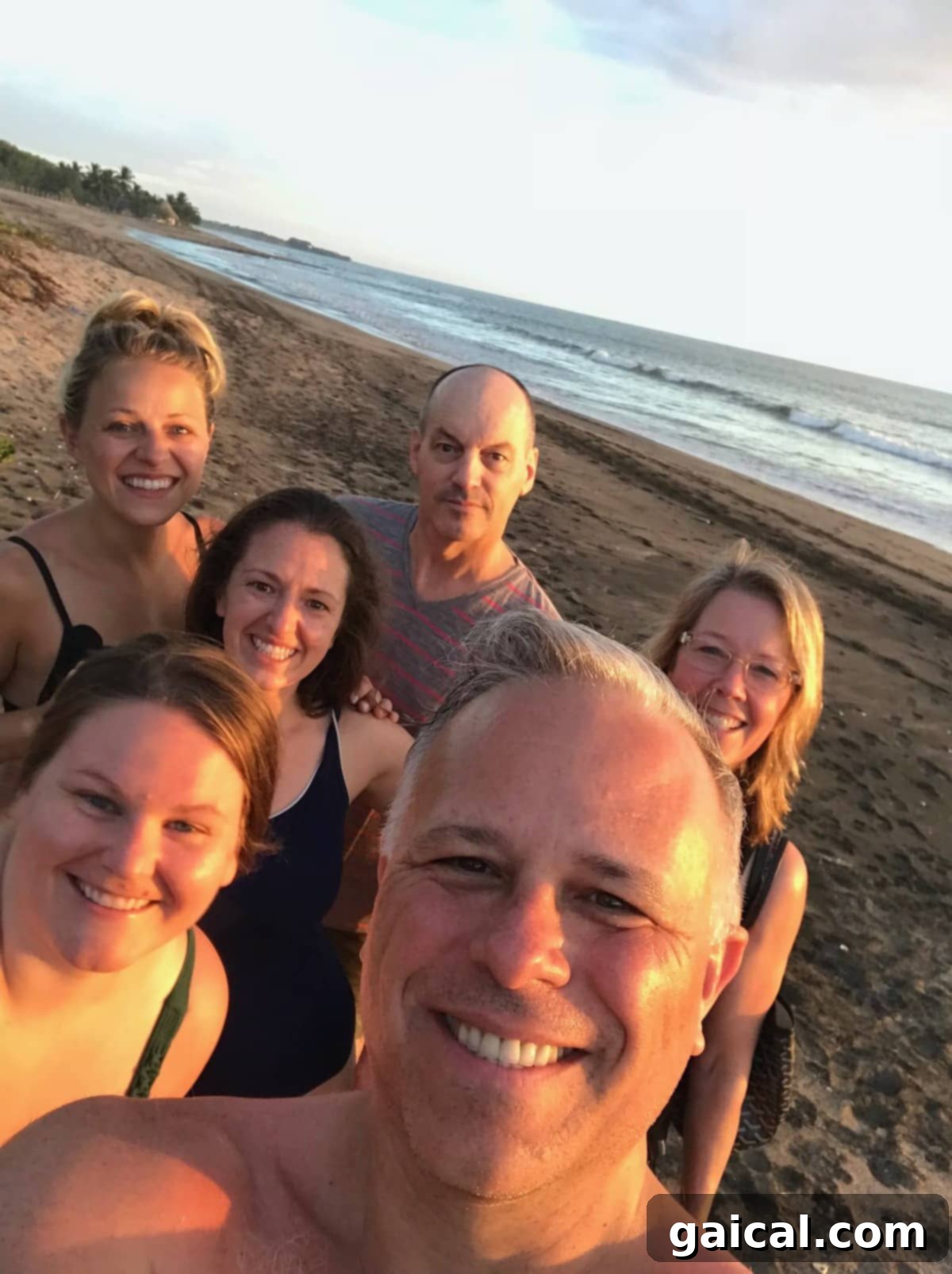 Head to Nicaragua for a Yoga retreat for your people! Friends capturing a selfie moment on a beautiful beach in Nicaragua, perfect for a yoga retreat.
