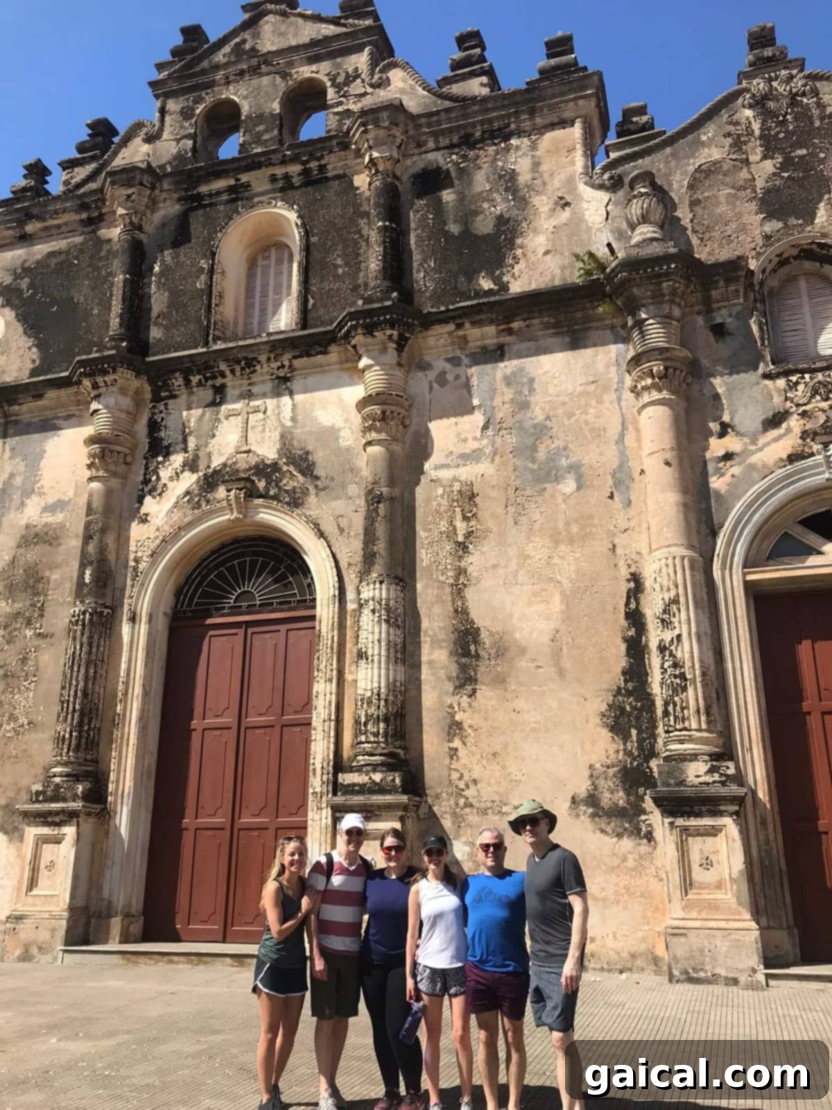 A travel guide to Granada in three days! Group of friends in front of a historic church, part of a travel guide to Granada in three days!