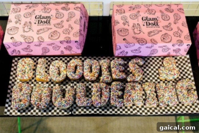 Glam Doll Donuts customized with the event name, a sweet treat for attendees.