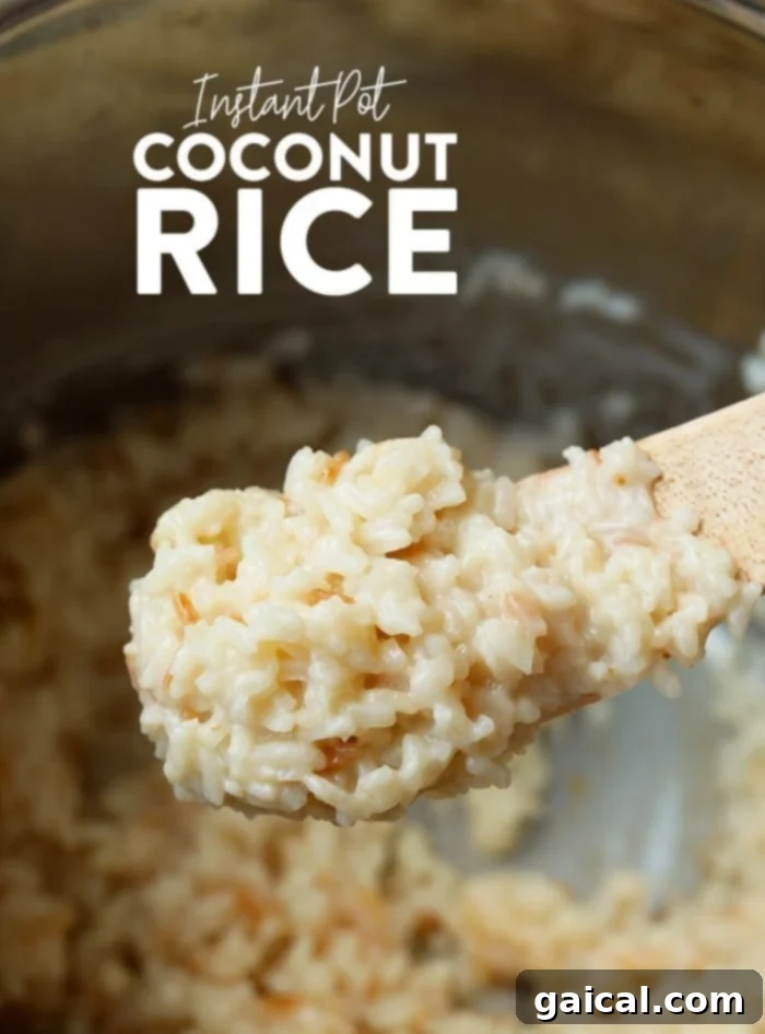 A bowl of Instant Pot Coconut Rice garnished with fresh herbs, ready to serve.