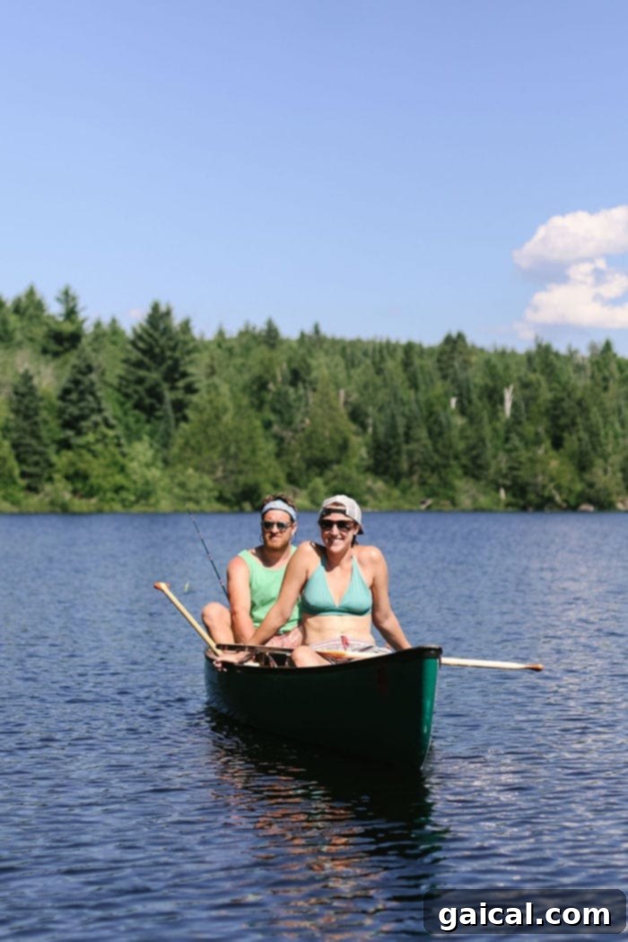 Canoeing in the Beautiful BWCA Fit Foodie Finds canoeing on a clear lake in the BWCA