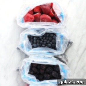Close-up of frozen berries in freezer-safe bags, neatly stored