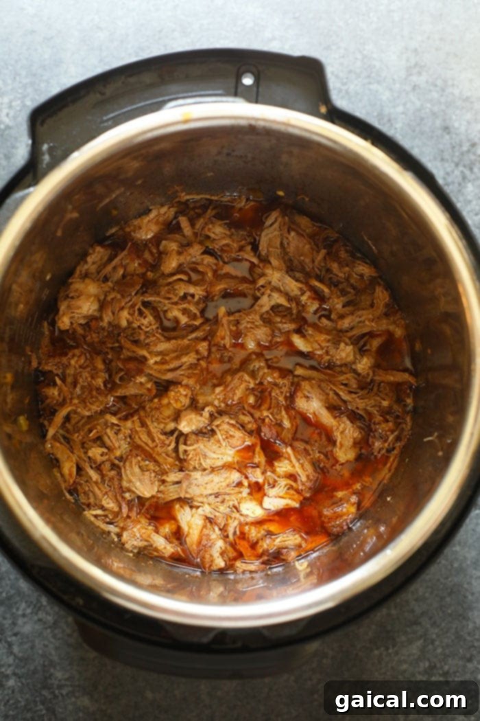 Easy shredded pork carnitas in the Instant Pot in just 90 minutes. Can I get a hell yes?! shredded pork