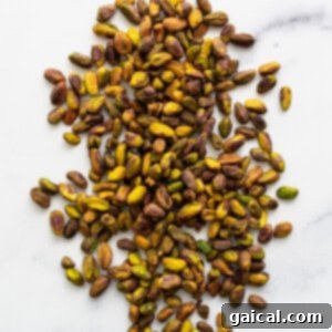 Roasted pistachios on the counter, ready for processing.