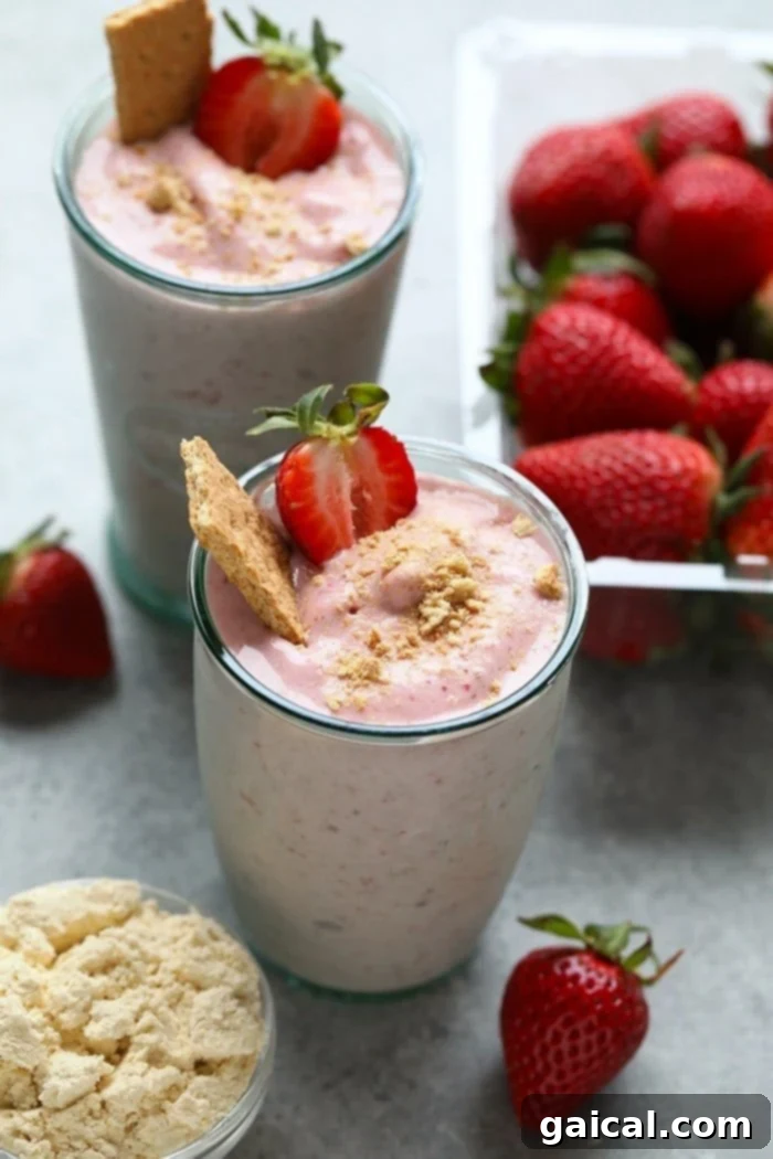 53 Game-Changing Plant-Based Recipes 16 Strawberry Cheesecake Protein Smoothie, a healthy and delicious vegan treat.