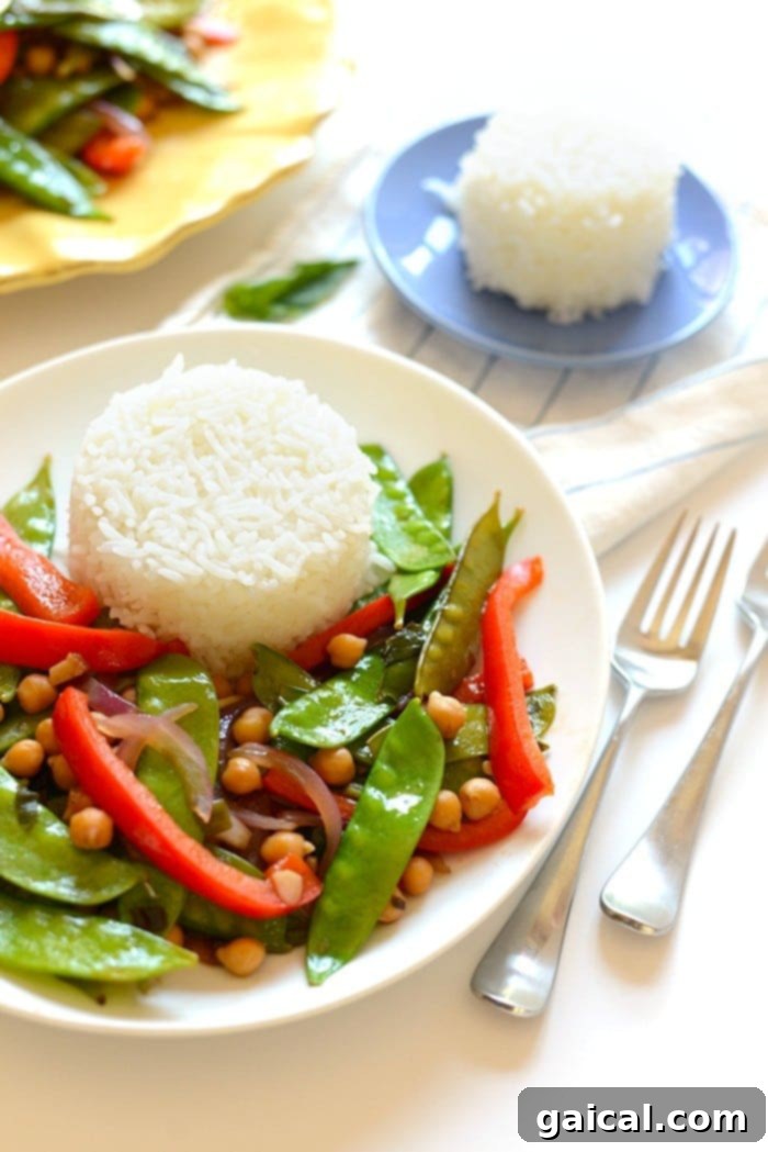 53 Game-Changing Plant-Based Recipes 28 Delicious Vegan Thai Basil Veggie Stir Fry with sticky rice.