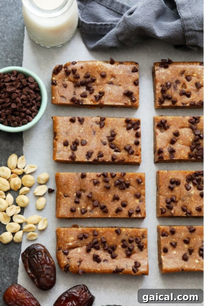 Easy Homemade Larabar Recipe A tray of homemade Larabars, cut and ready for snacking. This image highlights the simplicity and natural goodness of the recipe.