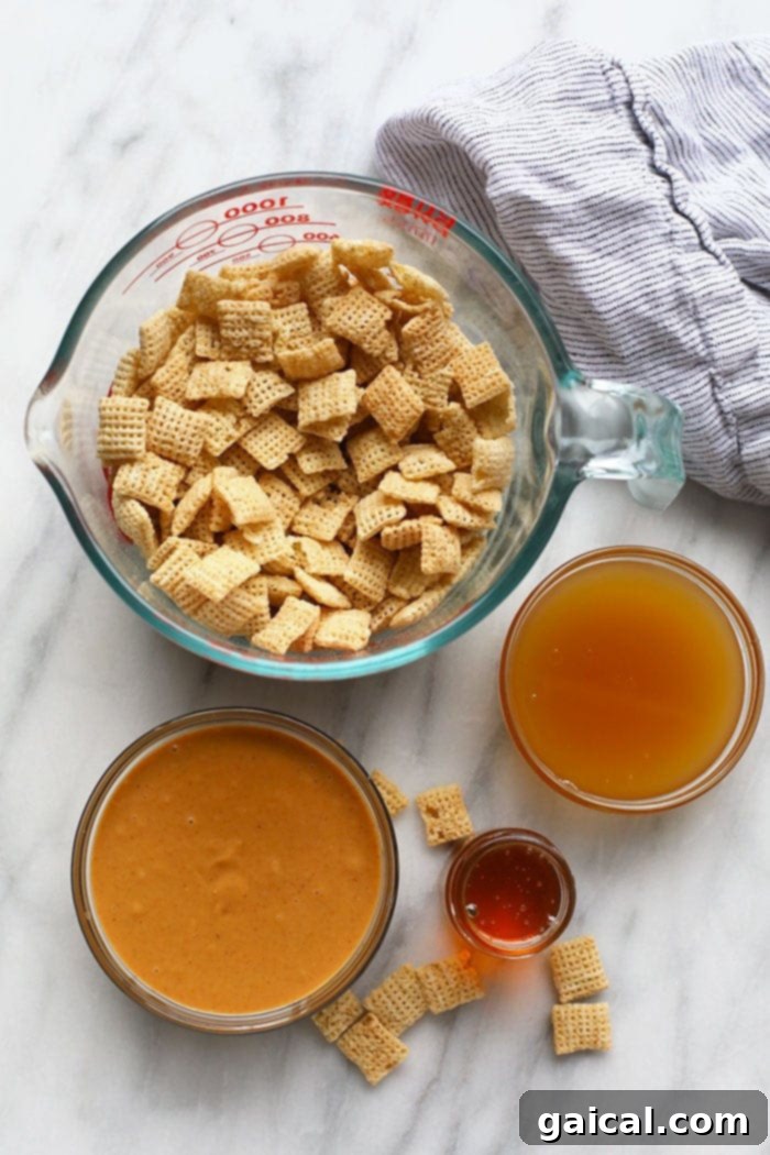 A selection of ingredients for no-bake peanut butter balls: Chex cereal, honey, and peanut butter, laid out ready for preparation.