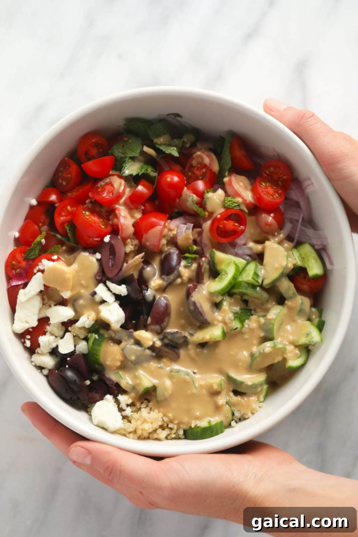 Colorful Mediterranean Quinoa Salad - Gluten-Free & Veggie-Packed A beautifully composed bowl of Mediterranean quinoa salad, ready to be enjoyed.
