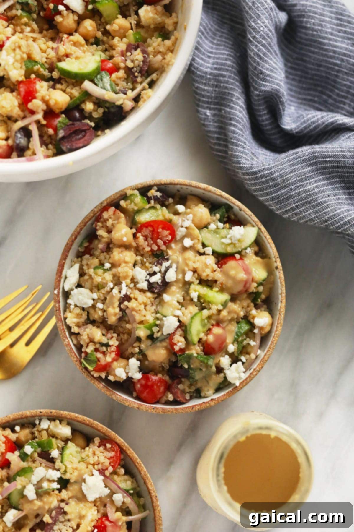 Delicious Quinoa Salad for Healthy Meals - Veggie Packed Two bowls of Mediterranean Quinoa Salad, beautifully garnished and ready to serve.