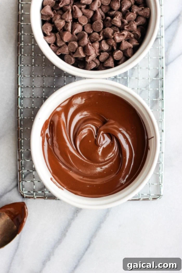 Premium Dark Chocolate Chips for Baking Close-up of high-quality dark chocolate chips, an essential ingredient for homemade chocolate pumpkin peanut butter cups.