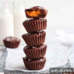 A perfectly crafted pumpkin peanut butter cup, showcasing its layers and inviting texture.