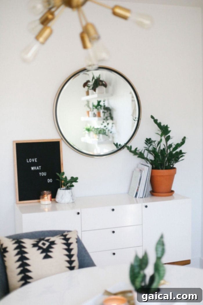 We're talking all things Fit Foodie HQ today with our mid century home office room reveal! Check out our new multi-person workspace fully equipped with mid-century open shelving for our photography props, plants galore, lots of modern decor, and a wall tapestry! Home Office Room Reveal