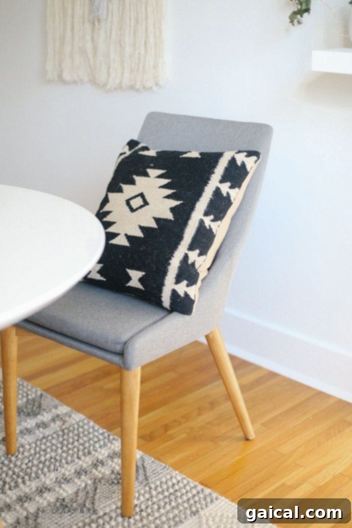 We're talking all things Fit Foodie HQ today with our mid-century home office room reveal! Check out our new multi-person workspace fully equipped with mid-century open shelving for our photography props, plants galore, lots of modern decor, and a wall tapestry! Aztec Pillow