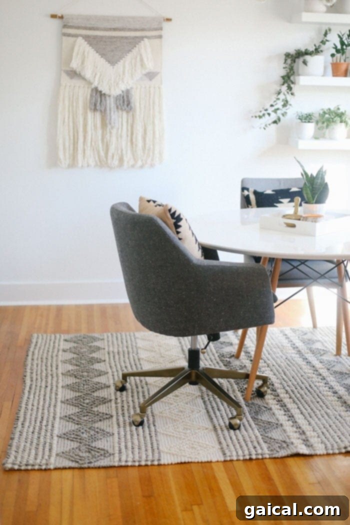 We're talking all things Fit Foodie HQ today with our mid-century home office room reveal! Check out our new multi-person workspace fully equipped with mid-century open shelving for our photography props, plants galore, lots of modern decor, and a wall tapestry! Bohemian Rug