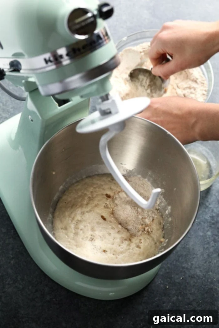 Guilt-Free Homemade Soft Pretzel Recipe 4 Active dry yeast blooming in warm water with sugar, forming a foamy layer.
