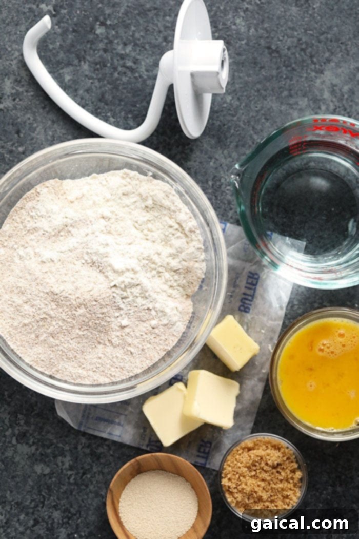 Guilt-Free Homemade Soft Pretzel Recipe 5 Soft pretzel dough being kneaded in a stand mixer with a dough hook.