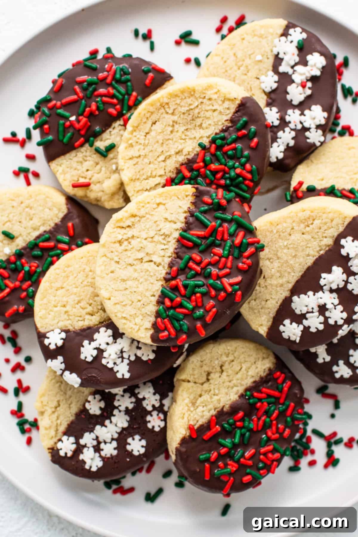 Delicate Almond Flour Shortbread 2 A plate piled high with golden-brown almond flour cookies, ready to be enjoyed.