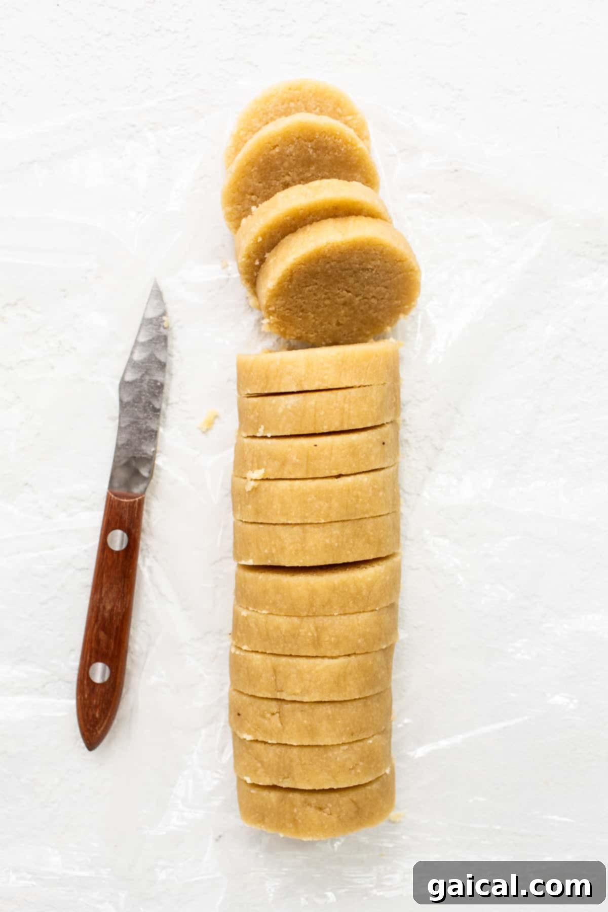 Delicate Almond Flour Shortbread 5 Perfectly sliced almond flour cookies arranged on a baking sheet, ready for the oven.