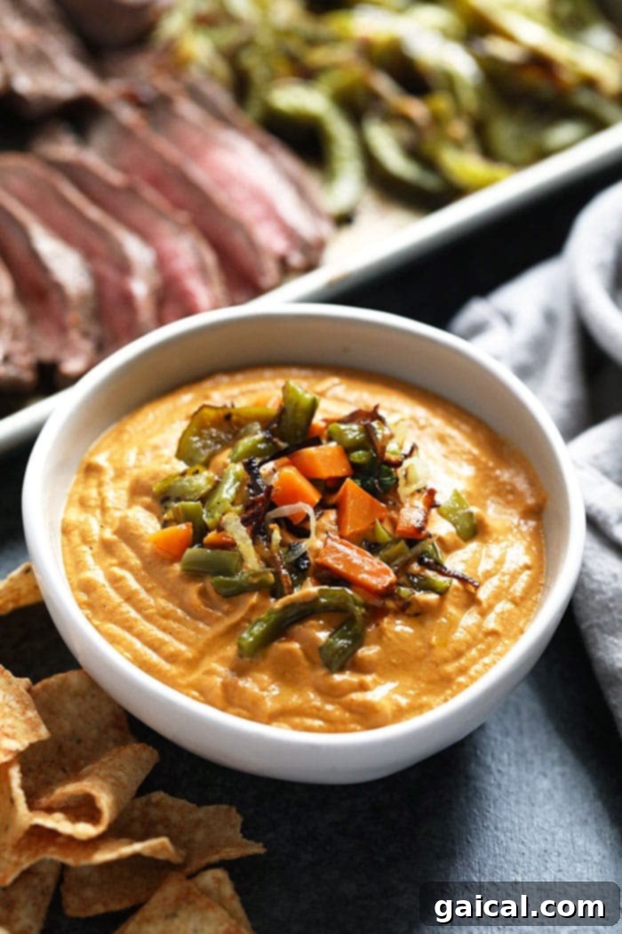 A bowl of rich, creamy vegan queso ready to be enjoyed.