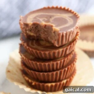 Chocolate Peanut Butter Keto Energy Bites 6 A decadent fat bomb recipe featuring peanut butter cups stacked high.