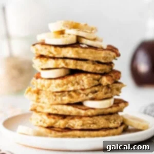 Stack of freshly cooked banana oatmeal pancakes