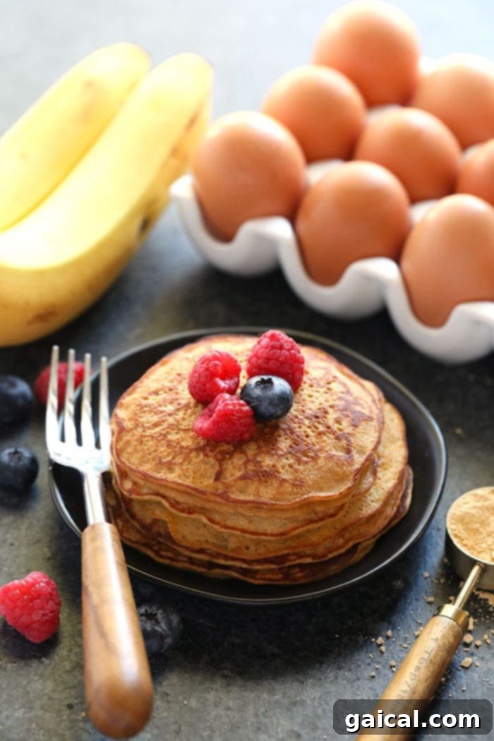 Serve up a stack of High-Protein Peanut Flour Pancakes A stack of high-protein peanut flour pancakes, ready to be served.