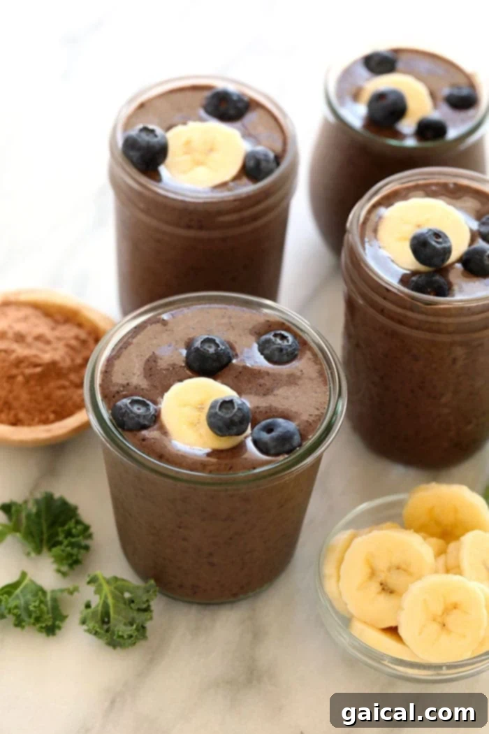 Nutrient-Rich Protein Elixir 2 A vibrant superfood protein smoothie served in an elegant glass, ready to be enjoyed.