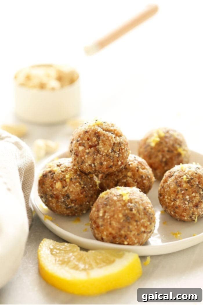 Delicious lemon cake energy balls arranged neatly on a plate, ready to be enjoyed as a healthy snack.