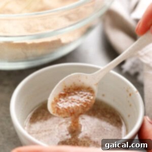 A thickened flax egg in a small bowl, showing its gelatinous texture.